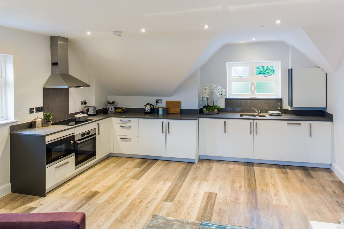 Kitchen under a sloping ceiling